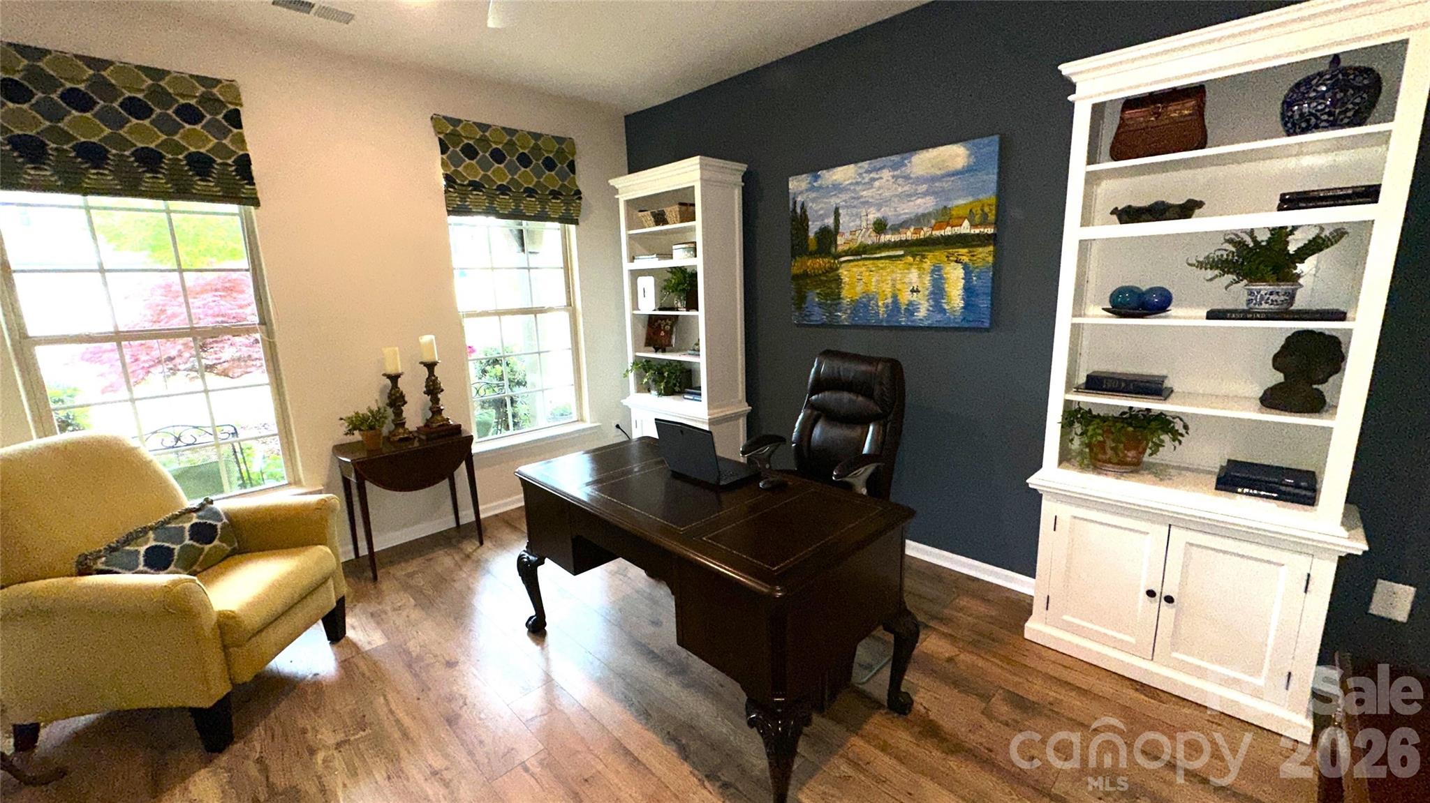 596 Moses Drive Fort Mill, SC 29707 - Photo 4 of 29 a living room with furniture window and wooden floor