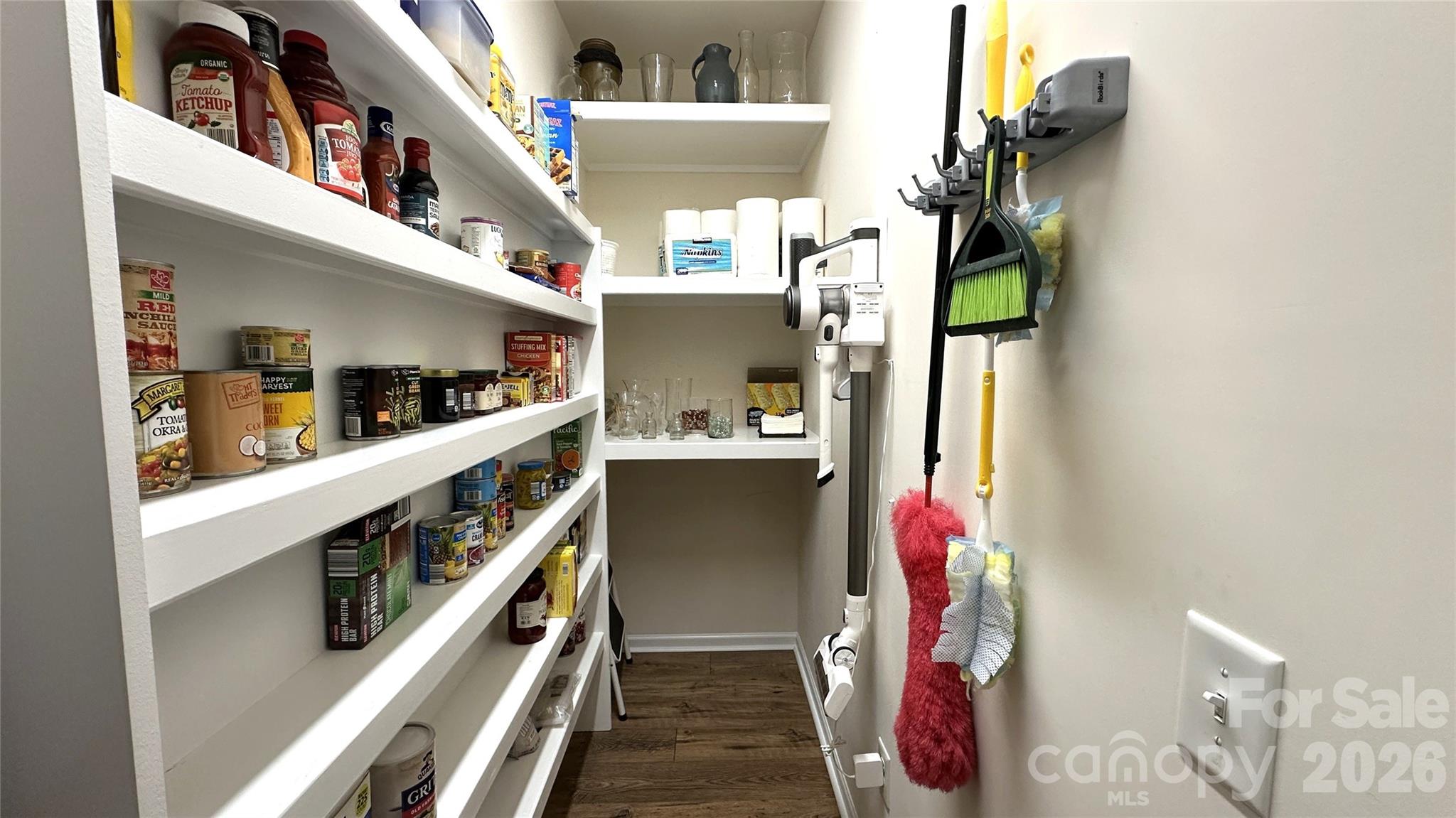 596 Moses Drive Fort Mill, SC 29707 - Photo 9 of 29 a view of walk in closet with clothes and shoes