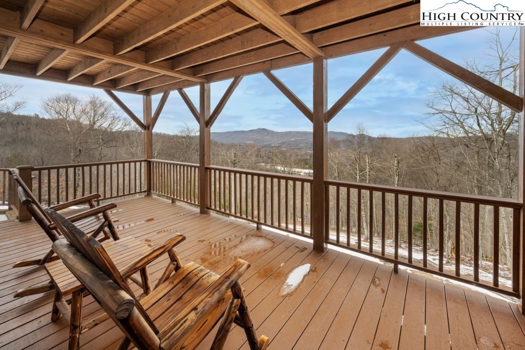 126 Rock Spring Circle Sugar Mountain, NC 28604 - Photo 26 of 29 a view of a balcony with furniture