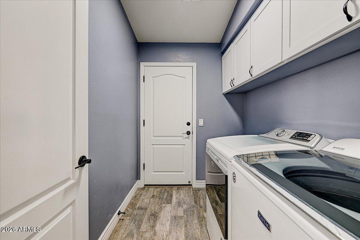 7624 North Citrus Road Waddell, AZ 85355 - Photo 20 of 57 a utility room with dryer and washer