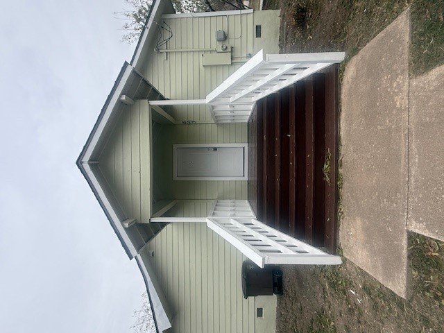 a view of a house with a window and stairs