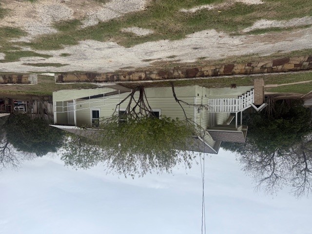 823 Monterrey Street Lockhart, TX 78644 - Photo 3 of 15 a front view of a house with a yard