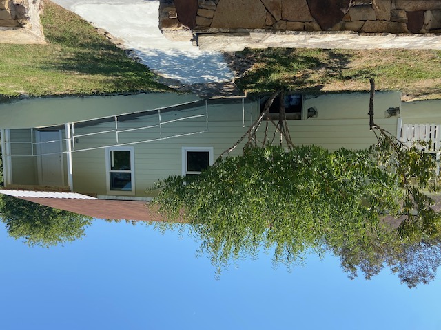 823 Monterrey Street Lockhart, TX 78644 - Photo 4 of 15 a view of a house with a yard