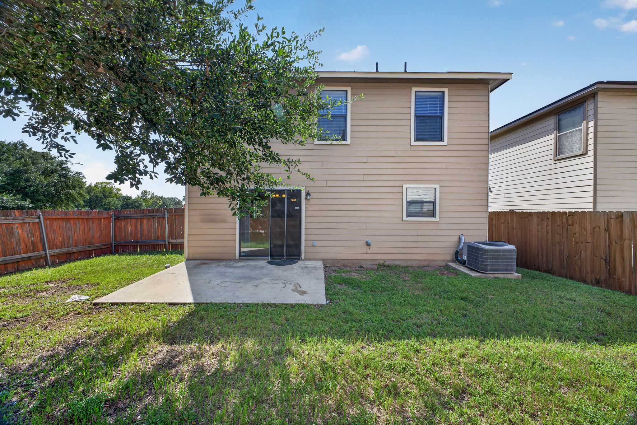 8813 Wiley Way Austin, TX 78747 - Photo 31 of 39 A private, fenced backyard offers a quiet space for relaxation and enjoyment.