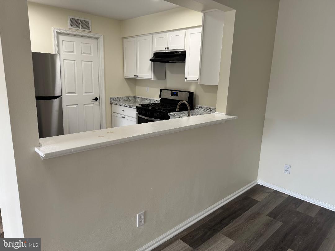 708B Ralston Drive Mount Laurel, NJ 08054 - Photo 15 of 44 a kitchen with a refrigerator and a stove