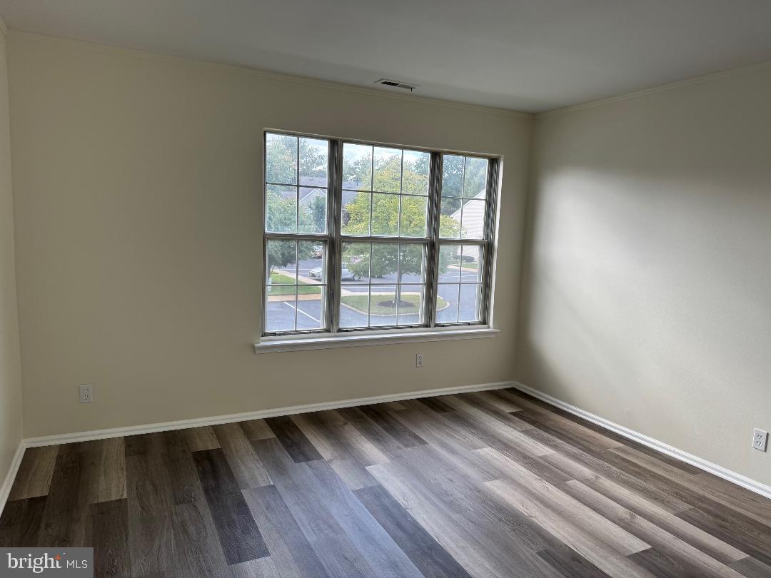 708B Ralston Drive Mount Laurel, NJ 08054 - Photo 18 of 44 an empty room with wooden floor and windows