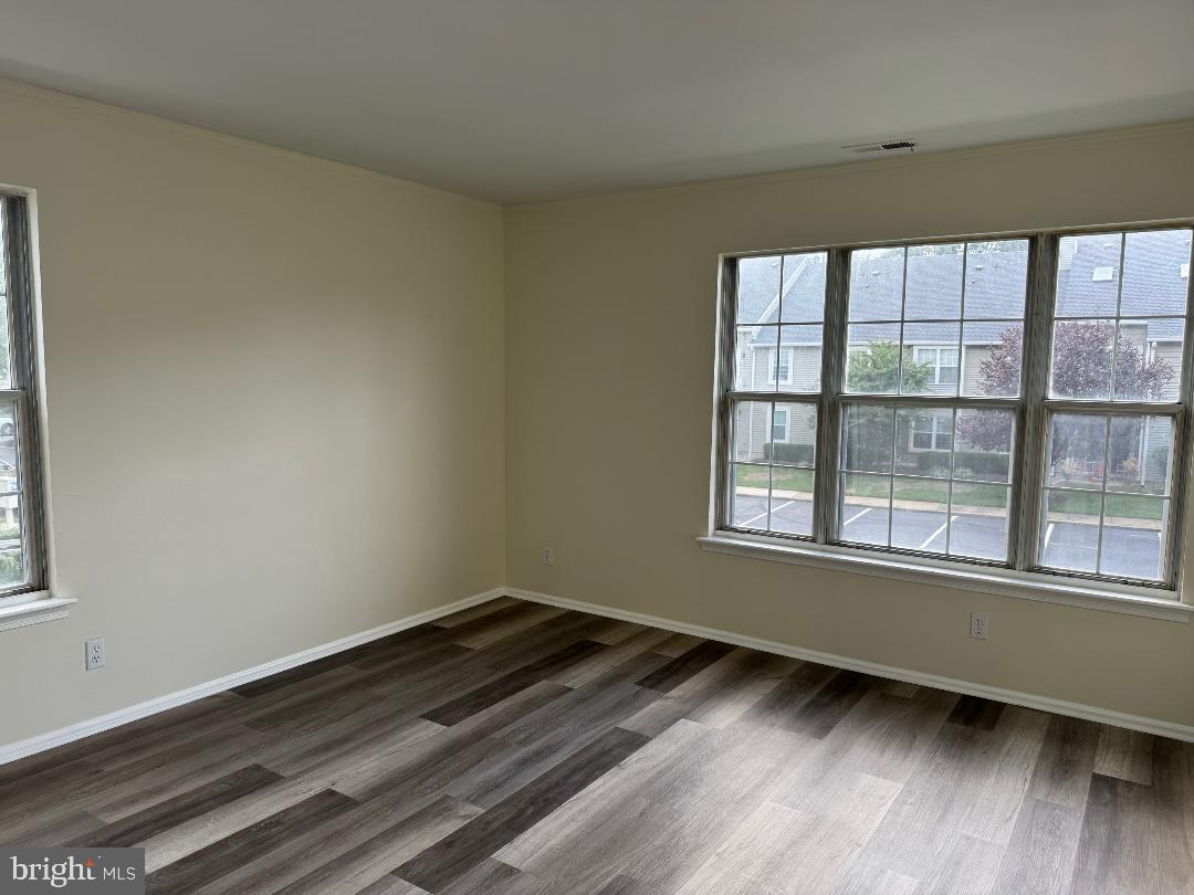 708B Ralston Drive Mount Laurel, NJ 08054 - Photo 19 of 44 an empty room with wooden floor and windows