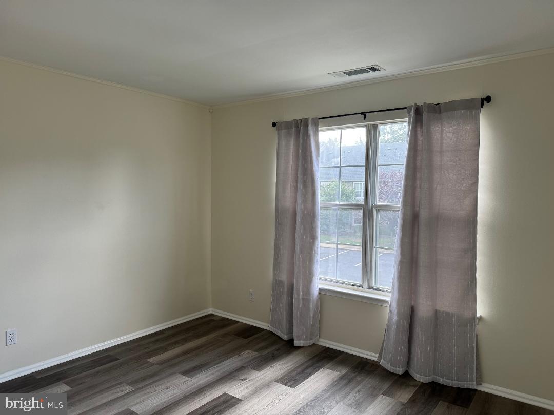 708B Ralston Drive Mount Laurel, NJ 08054 - Photo 23 of 44 an empty room with wooden floor and windows