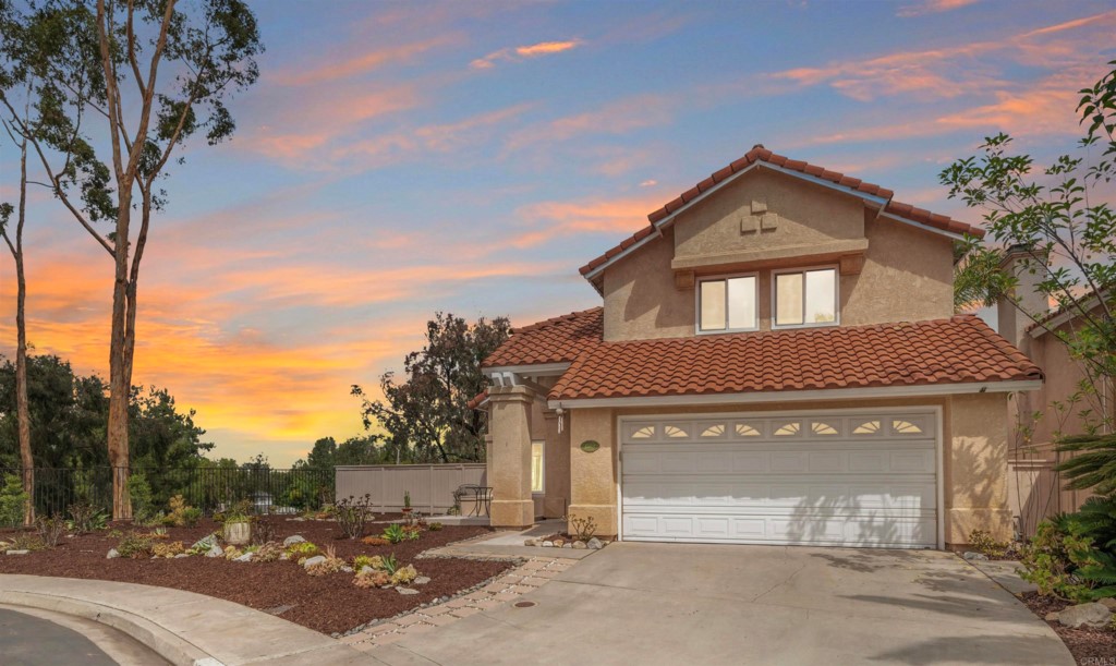 1504 Promontory Ridge Way Vista, CA 92081 - Photo 1 of 1 a front view of a house with a yard and garage