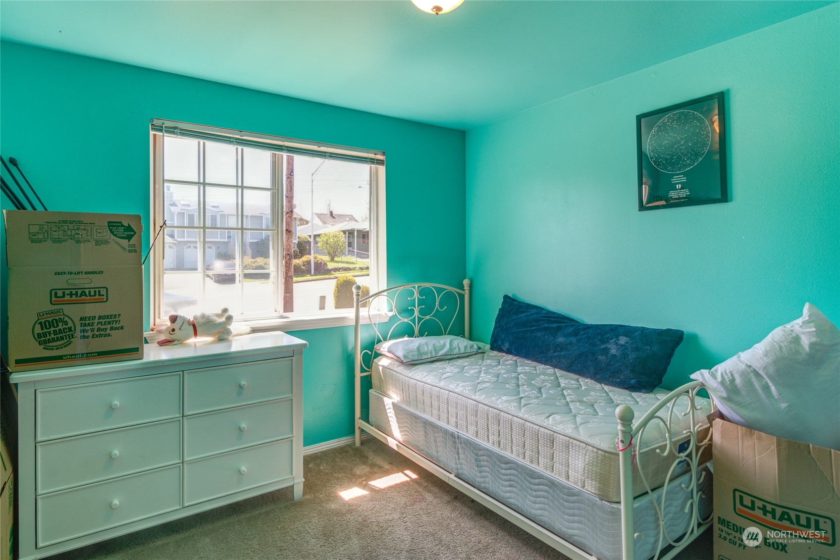 1663 South 48th Street Tacoma, WA 98408 - Photo 13 of 25 a bedroom with a bed and a window