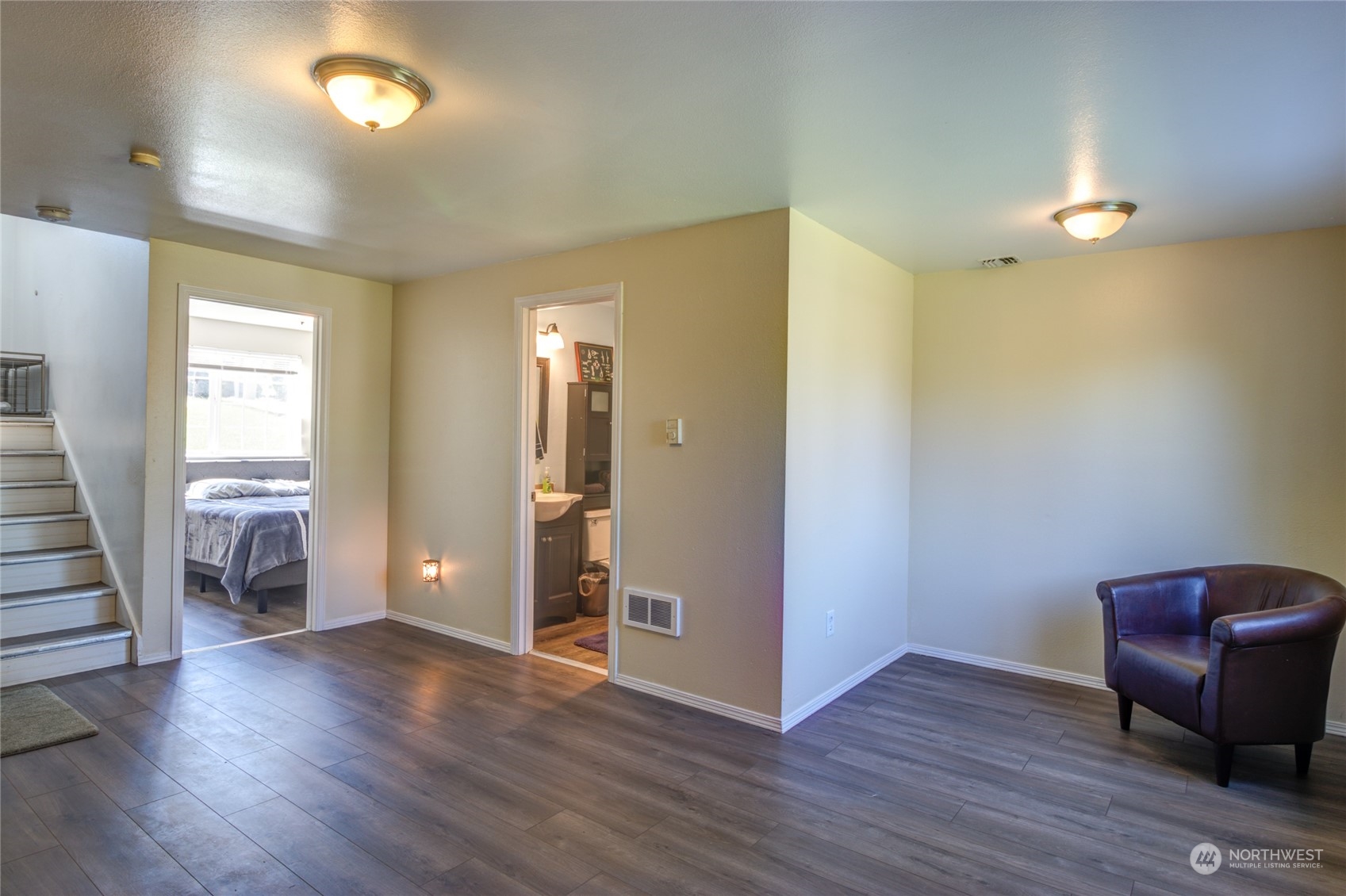 1663 South 48th Street Tacoma, WA 98408 - Photo 17 of 25 wooden floor in an empty room with a window