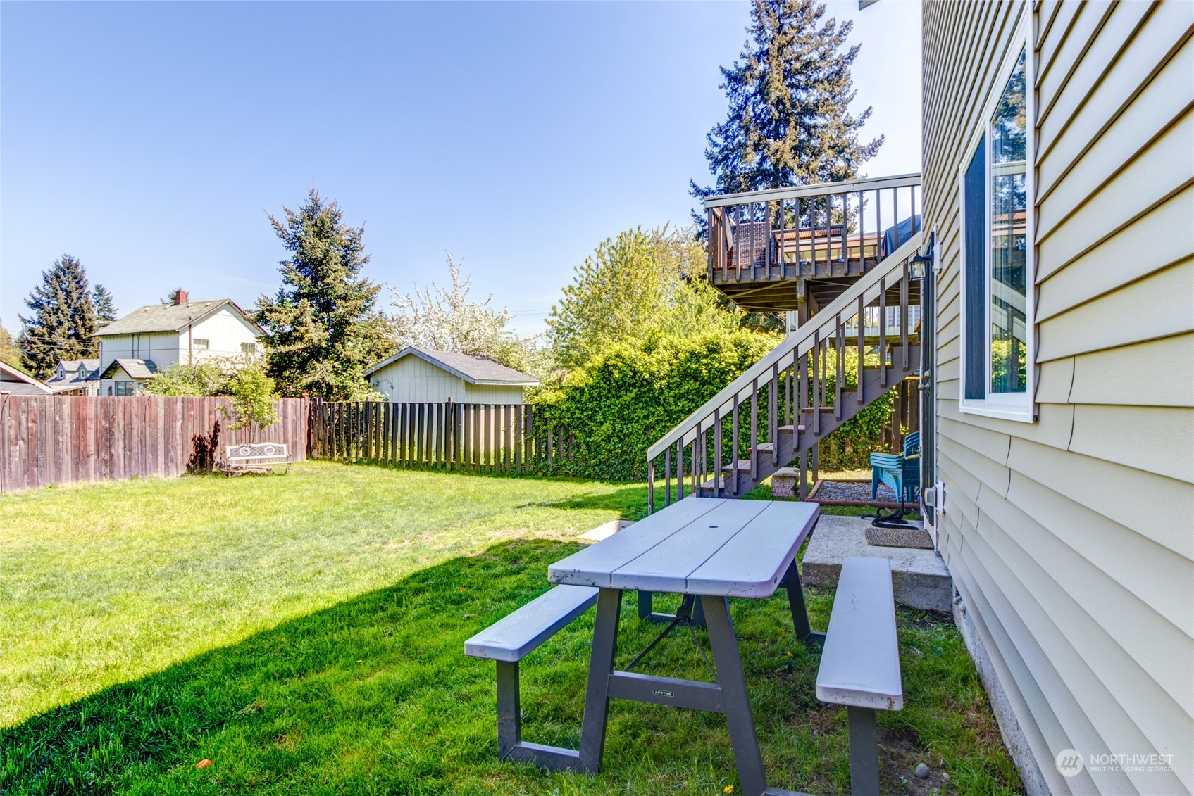 1663 South 48th Street Tacoma, WA 98408 - Photo 20 of 25 a view of a house with a yard