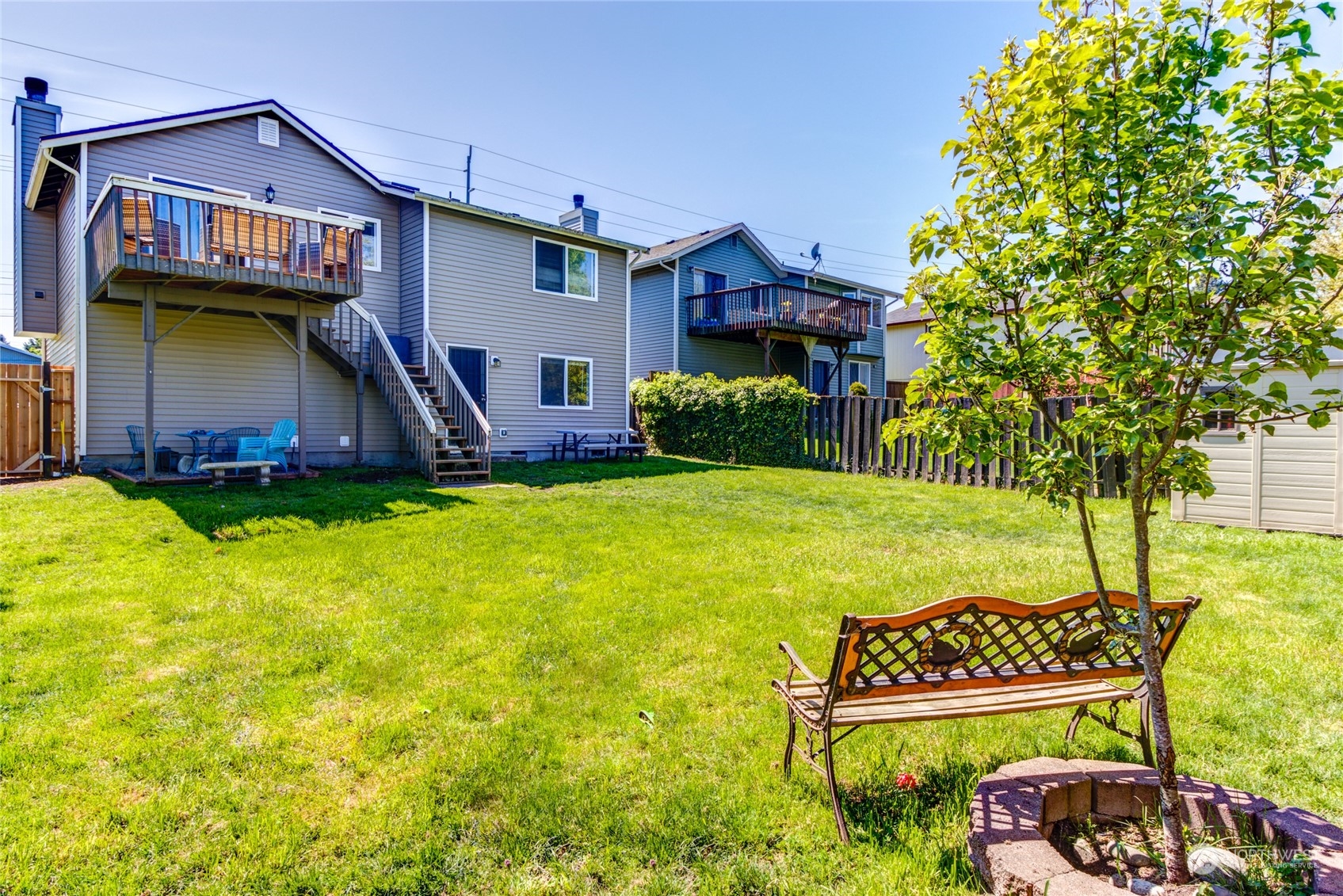 1663 South 48th Street Tacoma, WA 98408 - Photo 23 of 25 a front view of a house with garden