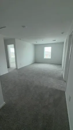 a utility room with cabinets