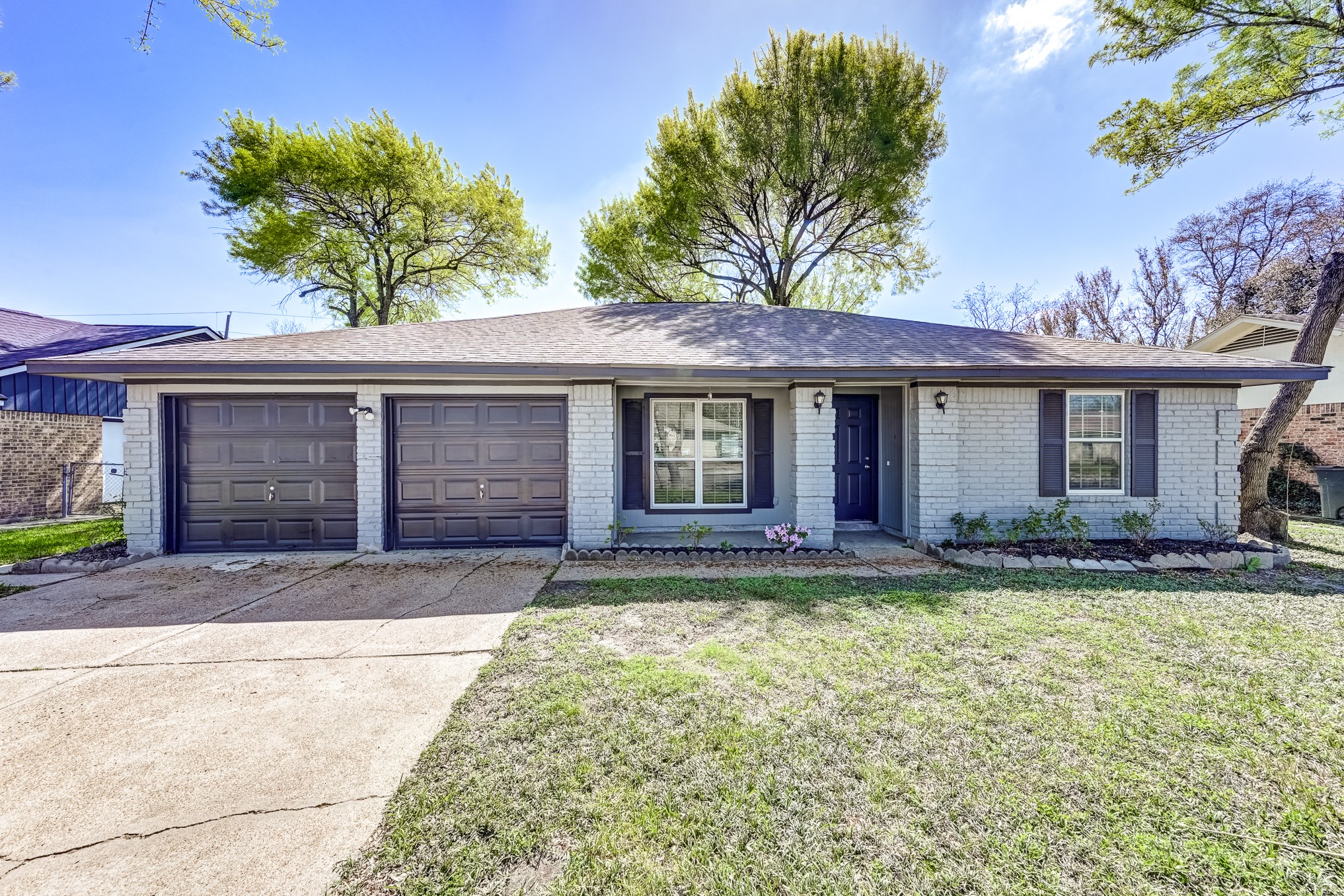 12415 Foxburo Drive Houston, TX 77065 - Photo 1 of 43 a front view of a house with garden