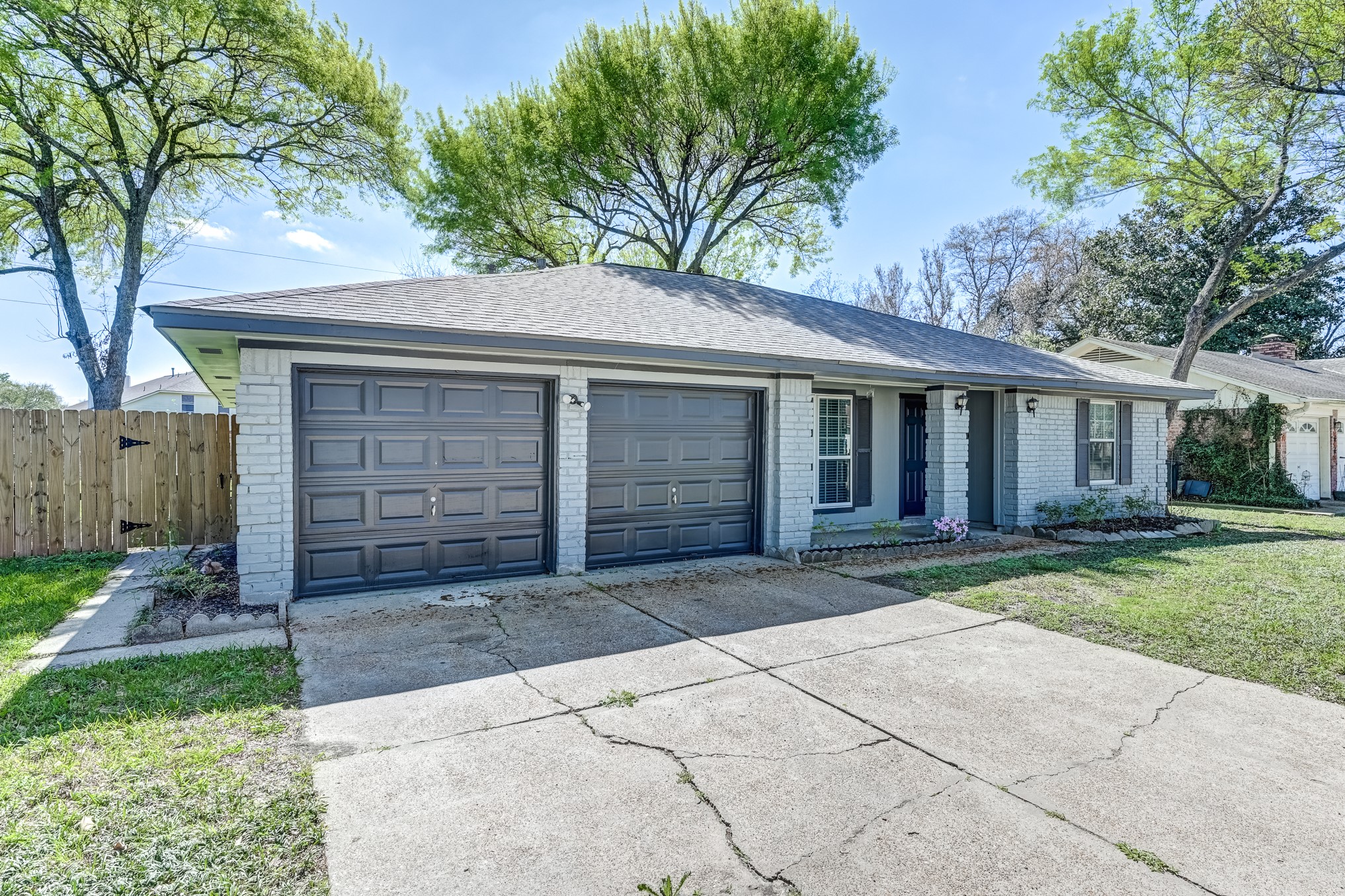 12415 Foxburo Drive Houston, TX 77065 - Photo 2 of 43 front view of a house with a yard