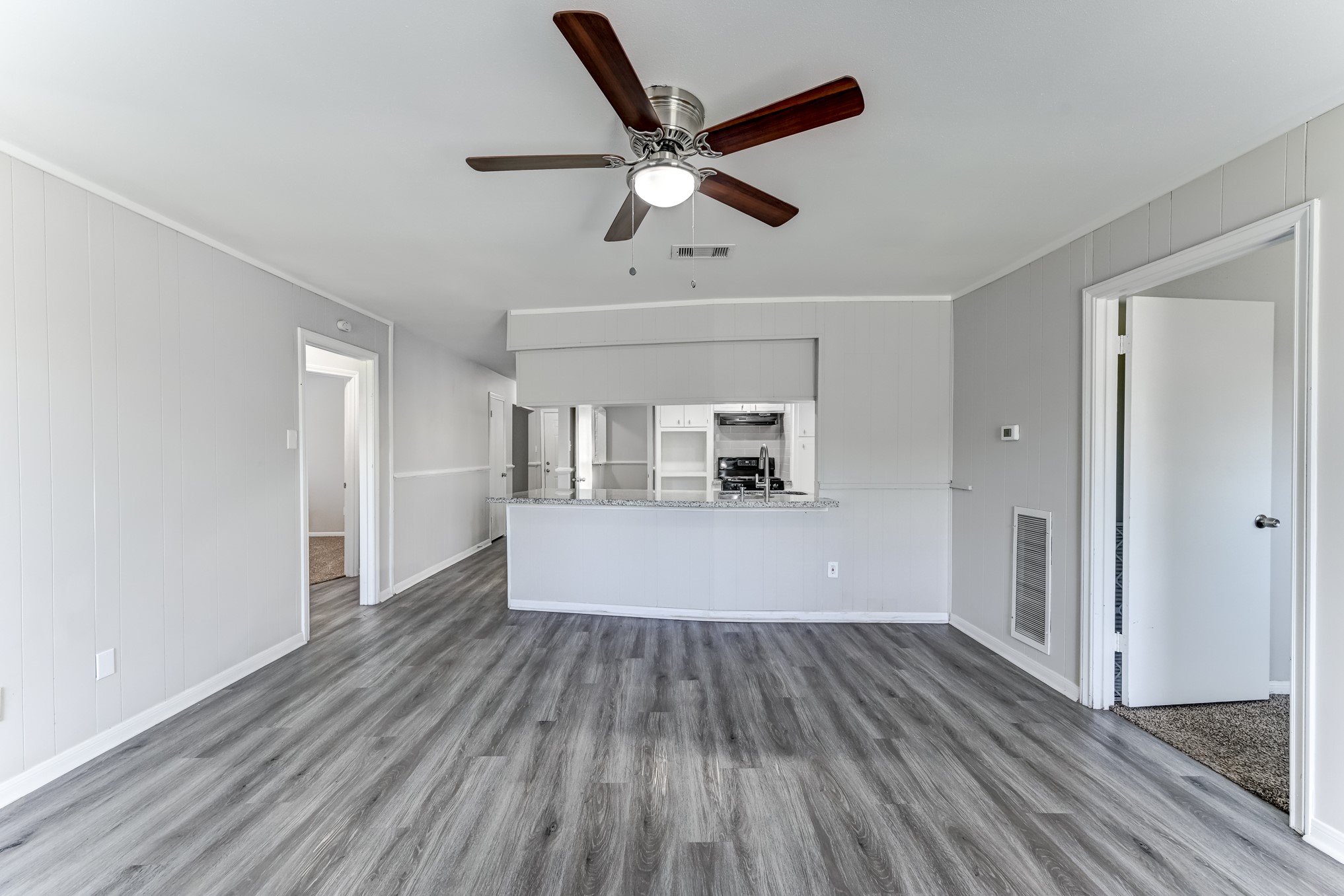 12415 Foxburo Drive Houston, TX 77065 - Photo 23 of 43 a view of empty room with wooden floor