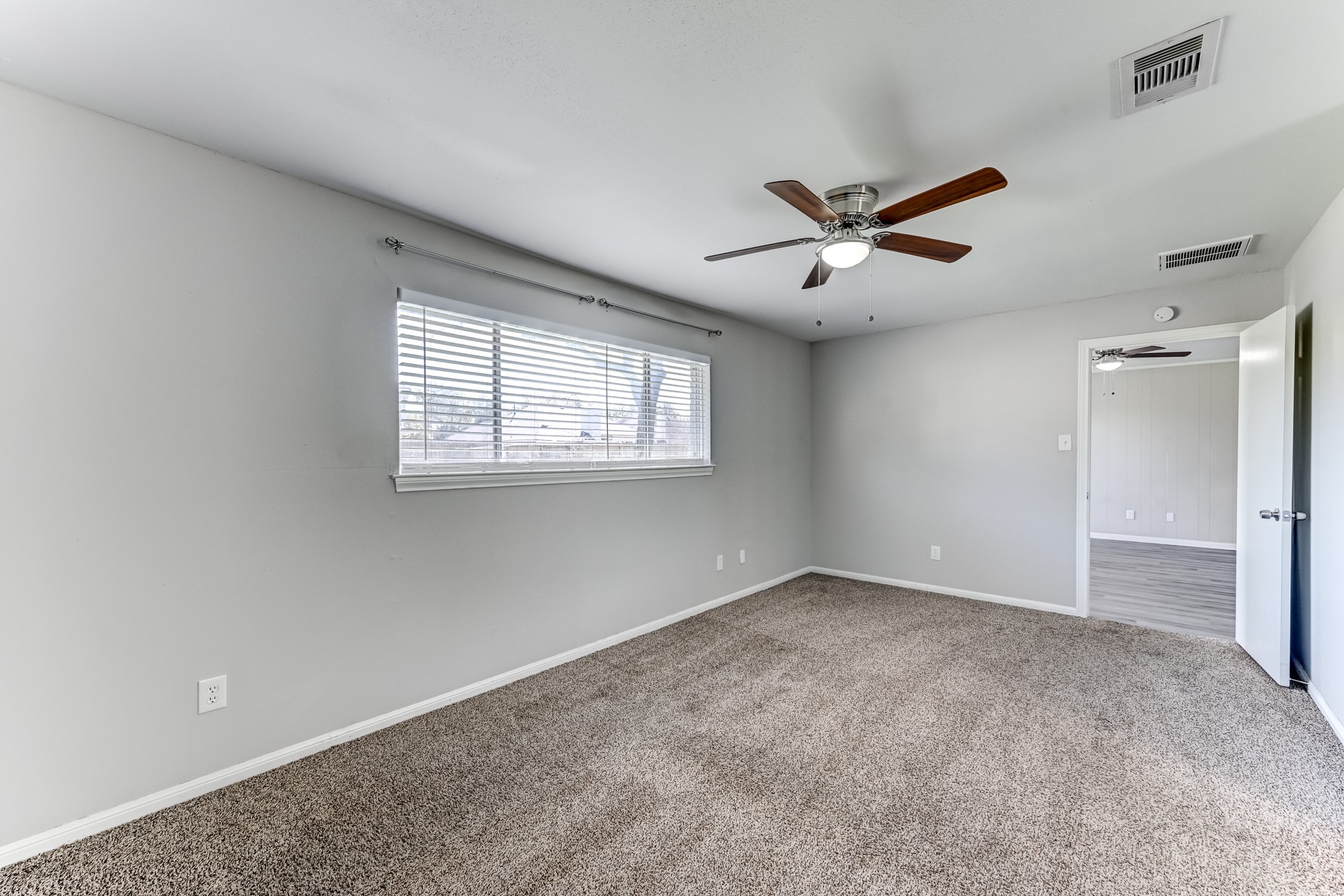 12415 Foxburo Drive Houston, TX 77065 - Photo 27 of 43 a view of an empty room with a window