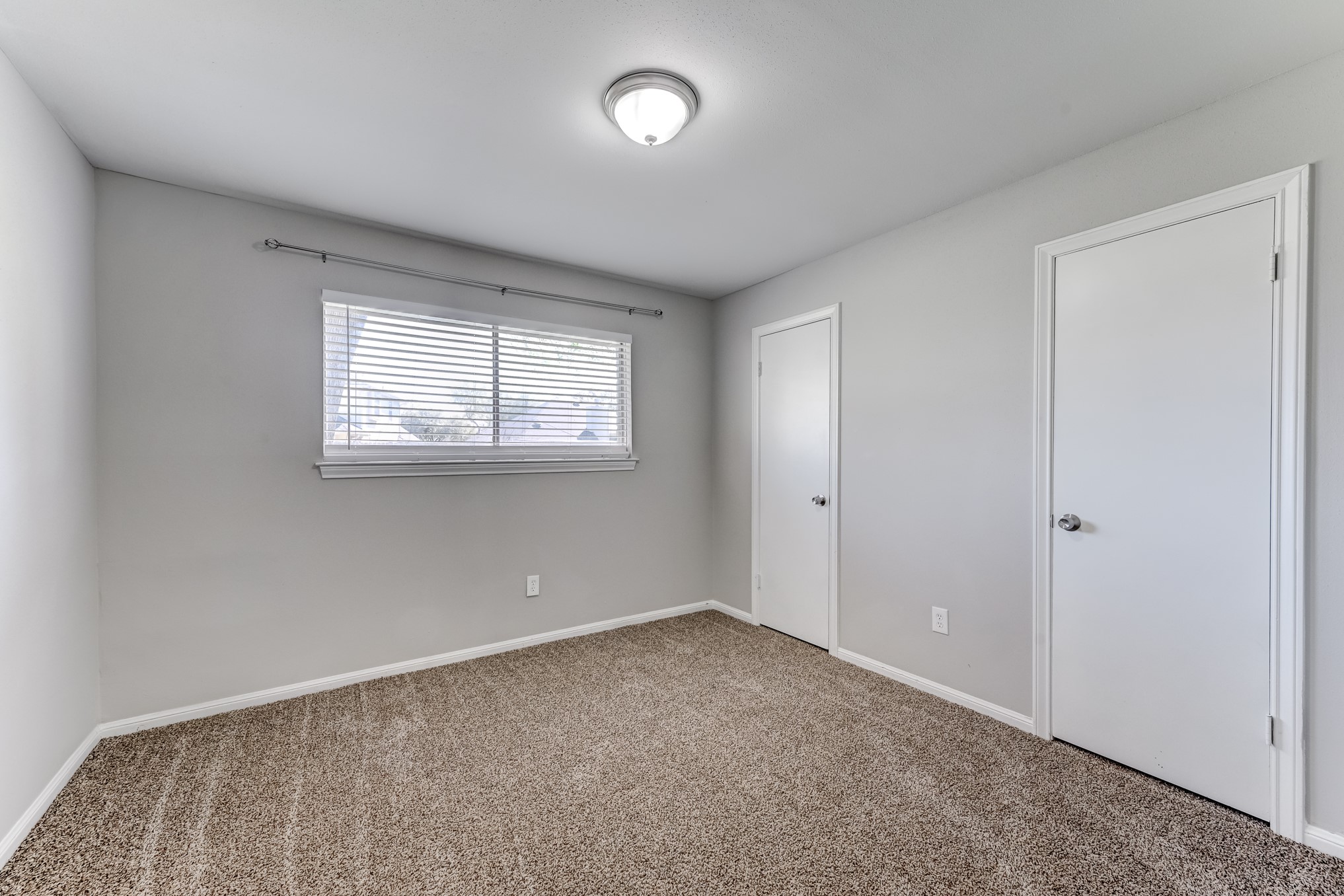 12415 Foxburo Drive Houston, TX 77065 - Photo 32 of 43 an empty room with a window