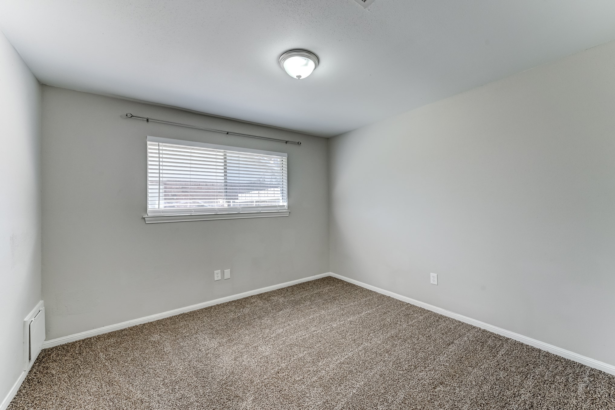 12415 Foxburo Drive Houston, TX 77065 - Photo 37 of 43 an empty room with a window