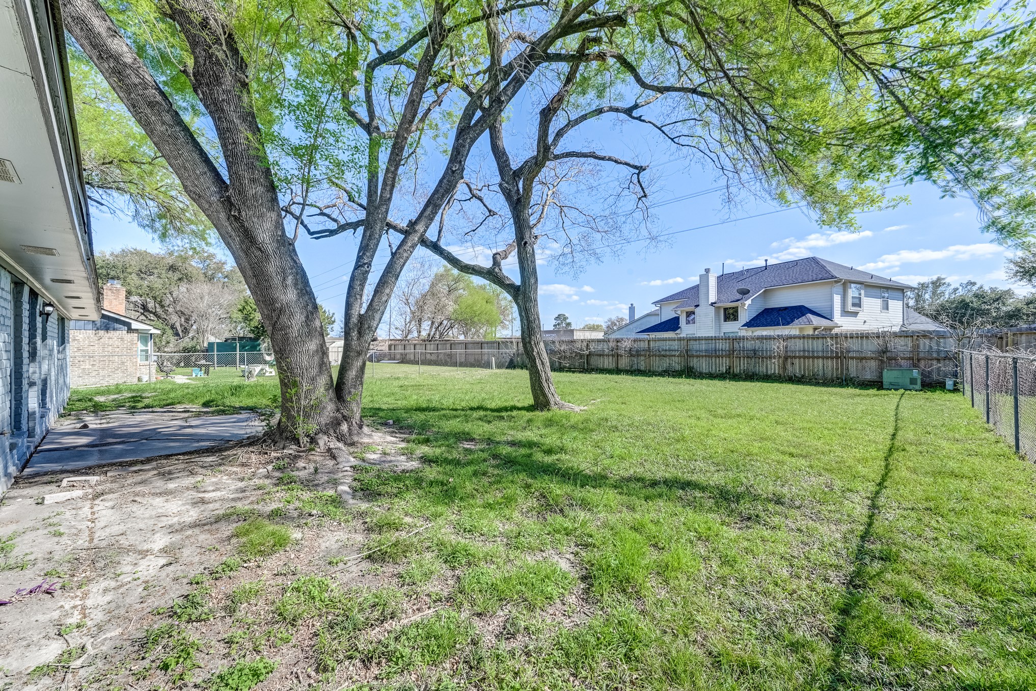 12415 Foxburo Drive Houston, TX 77065 - Photo 40 of 43 a view of outdoor space with deck and trees