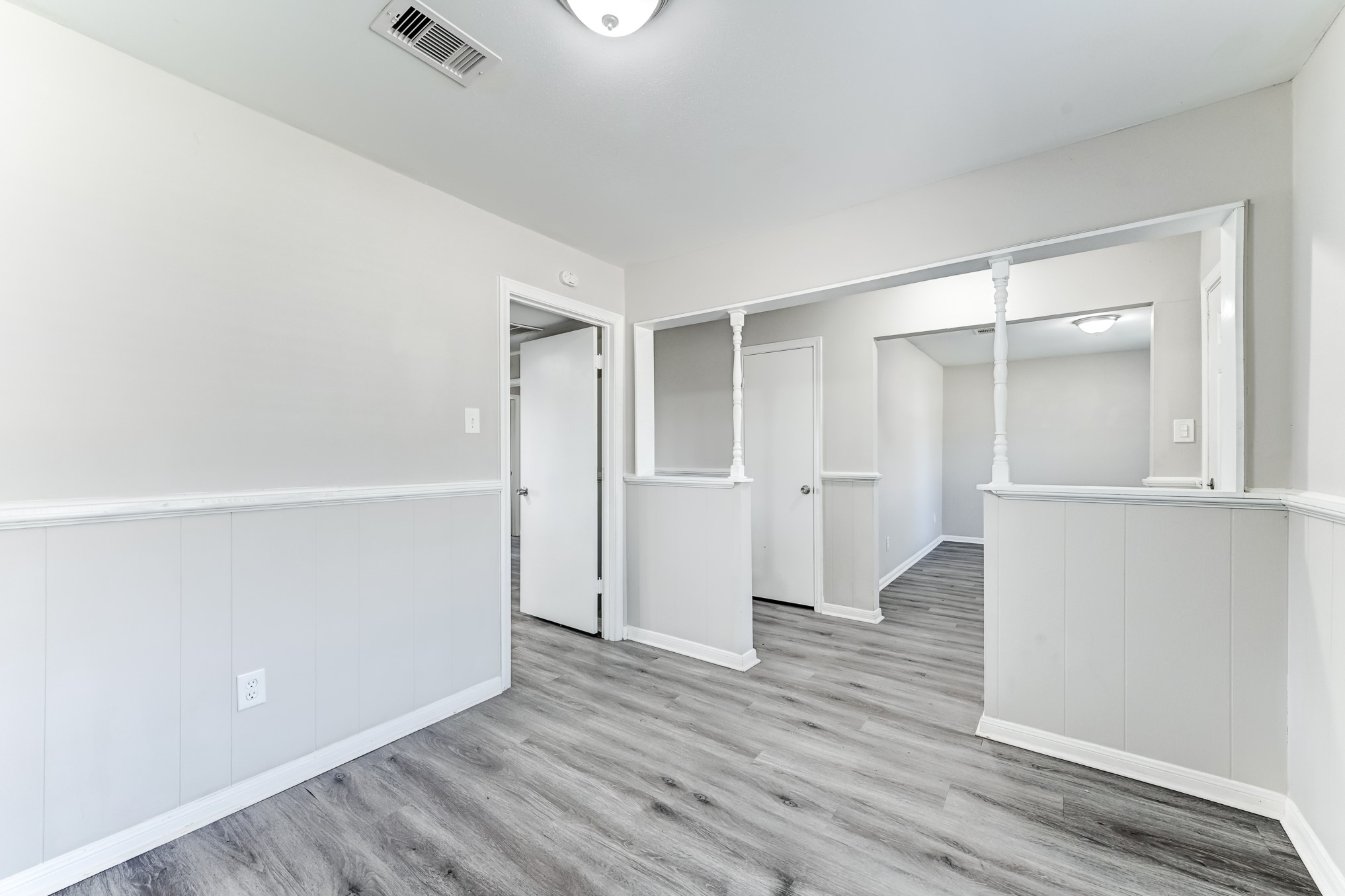12415 Foxburo Drive Houston, TX 77065 - Photo 7 of 43 a view of an empty room with wooden floor