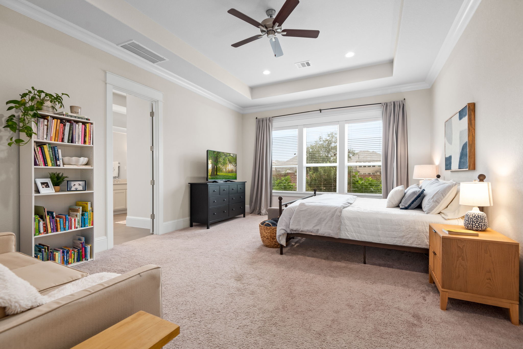 2335 Pale Star Drive Conroe, TX 77384 - Photo 19 of 42 a bed room with a bed and a book shelf