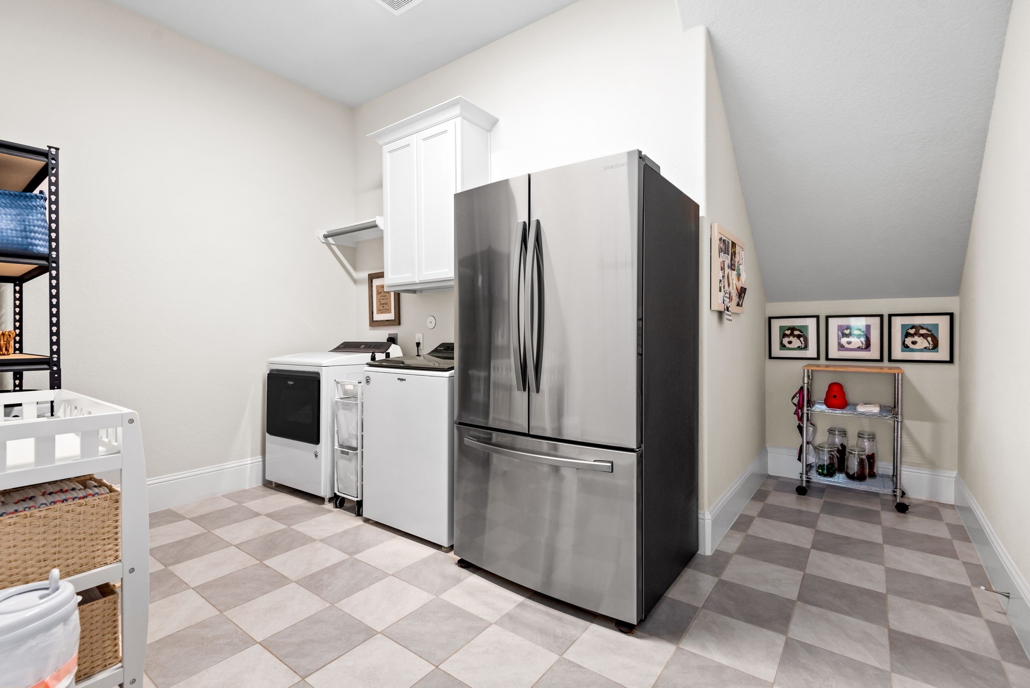 2335 Pale Star Drive Conroe, TX 77384 - Photo 30 of 42 a kitchen with stainless steel appliances a refrigerator and a stove