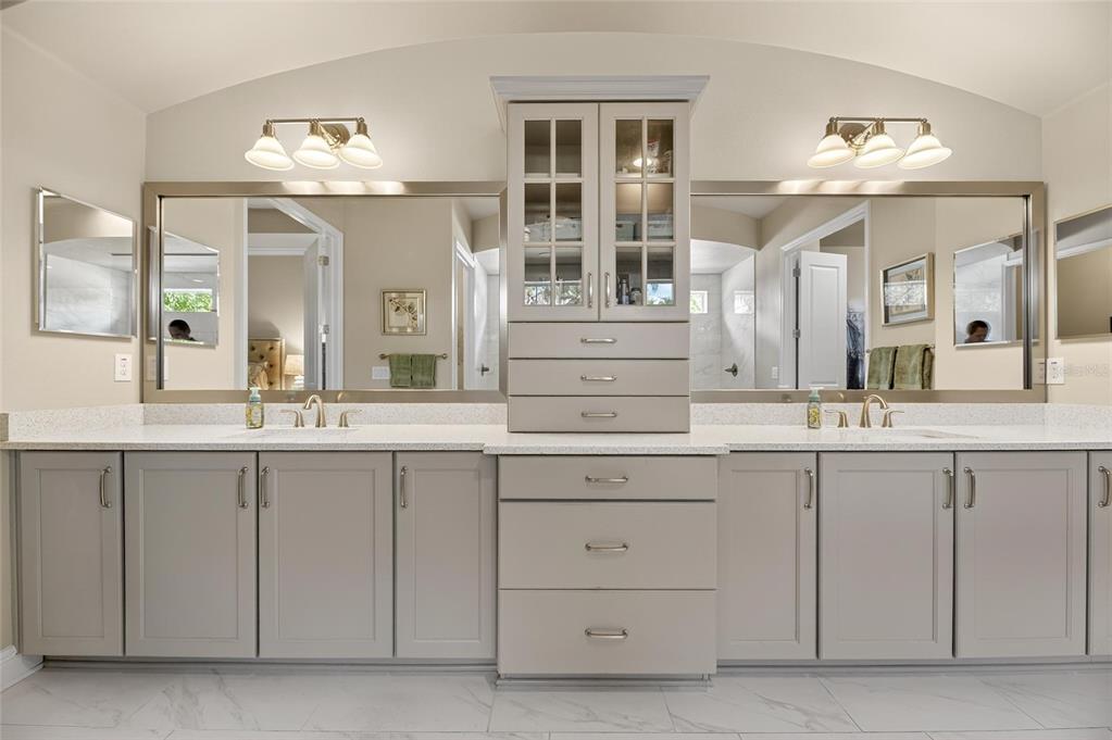 6002 Sparrowhead Way Lithia, FL 33547 - Photo 31 of 55 a bathroom with a sink and a large mirror