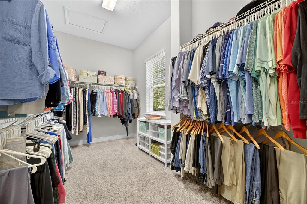 6002 Sparrowhead Way Lithia, FL 33547 - Photo 35 of 55 a view of walk in closet with clothes