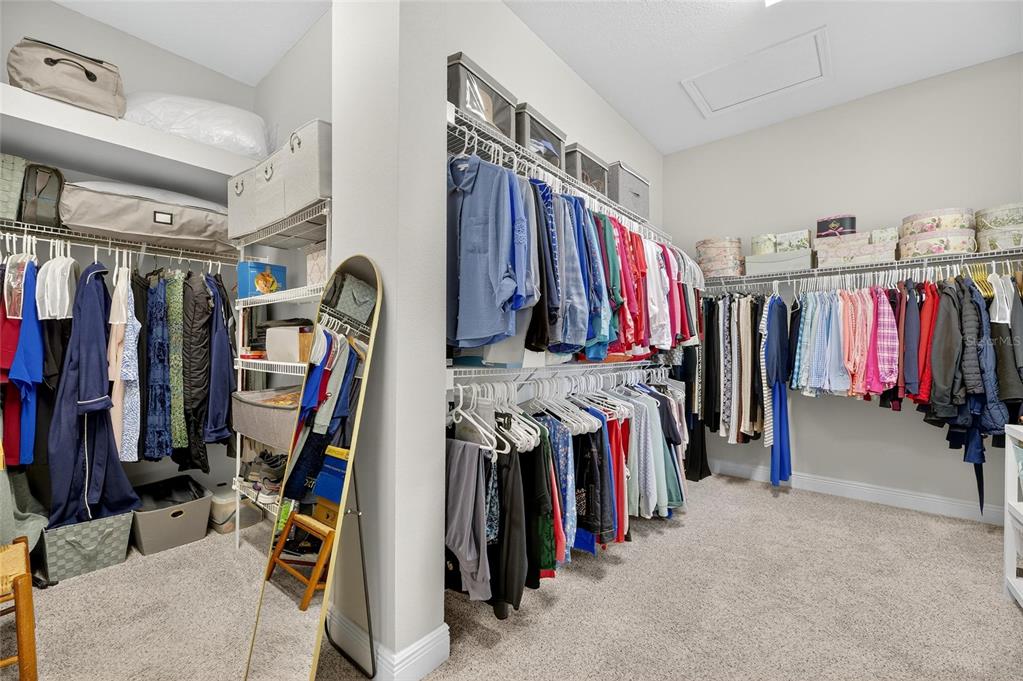 6002 Sparrowhead Way Lithia, FL 33547 - Photo 36 of 55 a view of walk in closet with clothes