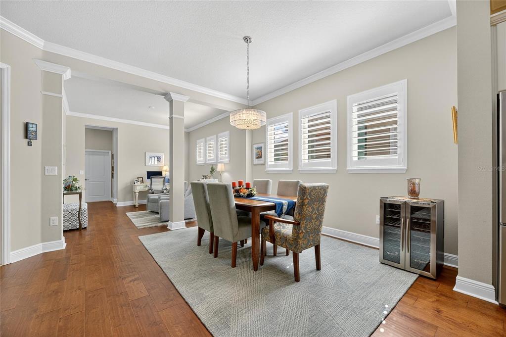 6002 Sparrowhead Way Lithia, FL 33547 - Photo 37 of 55 a view of a dining room with furniture window and wooden floor