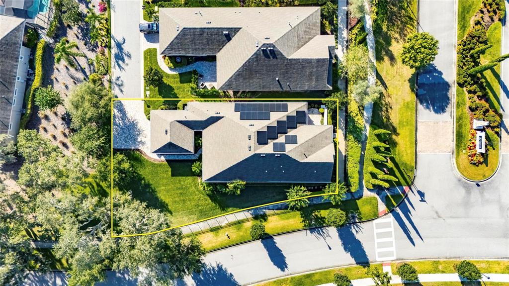 6002 Sparrowhead Way Lithia, FL 33547 - Photo 49 of 55 an aerial view of a house with swimming pool and garden