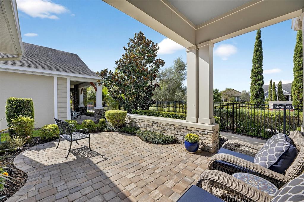 6002 Sparrowhead Way Lithia, FL 33547 - Photo 5 of 55 a building outdoor space with patio furniture