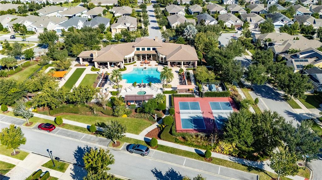 6002 Sparrowhead Way Lithia, FL 33547 - Photo 51 of 57 an aerial view of residential houses and car parked