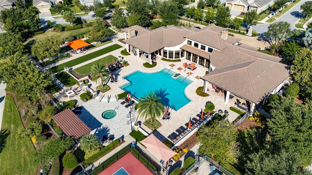 6002 Sparrowhead Way Lithia, FL 33547 - Photo 53 of 57 an aerial view of house with yard swimming pool and outdoor seating
