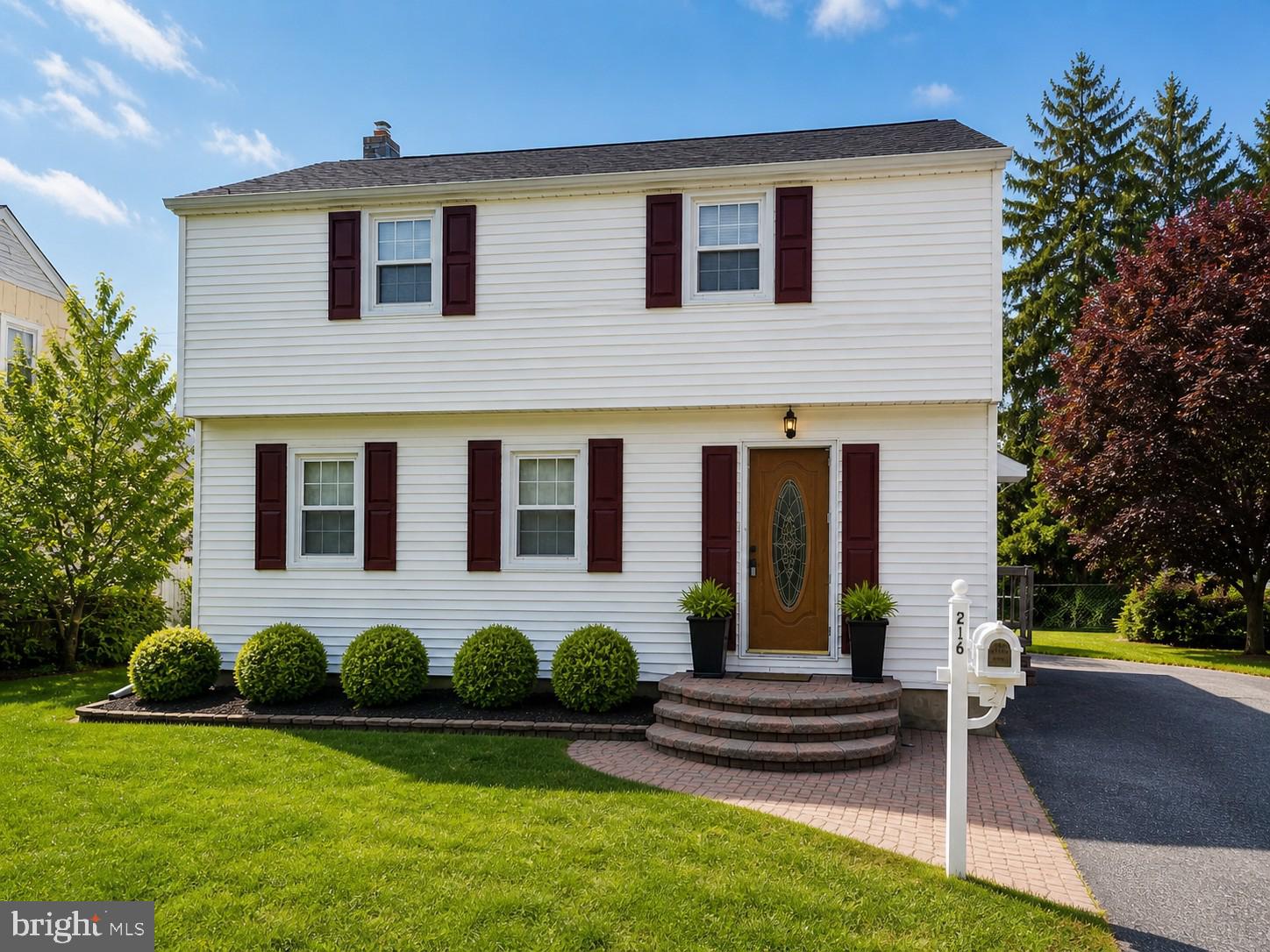 216 Georgetown Road Glassboro, NJ 08028 - Photo 3 of 17 a front view of a house with garden