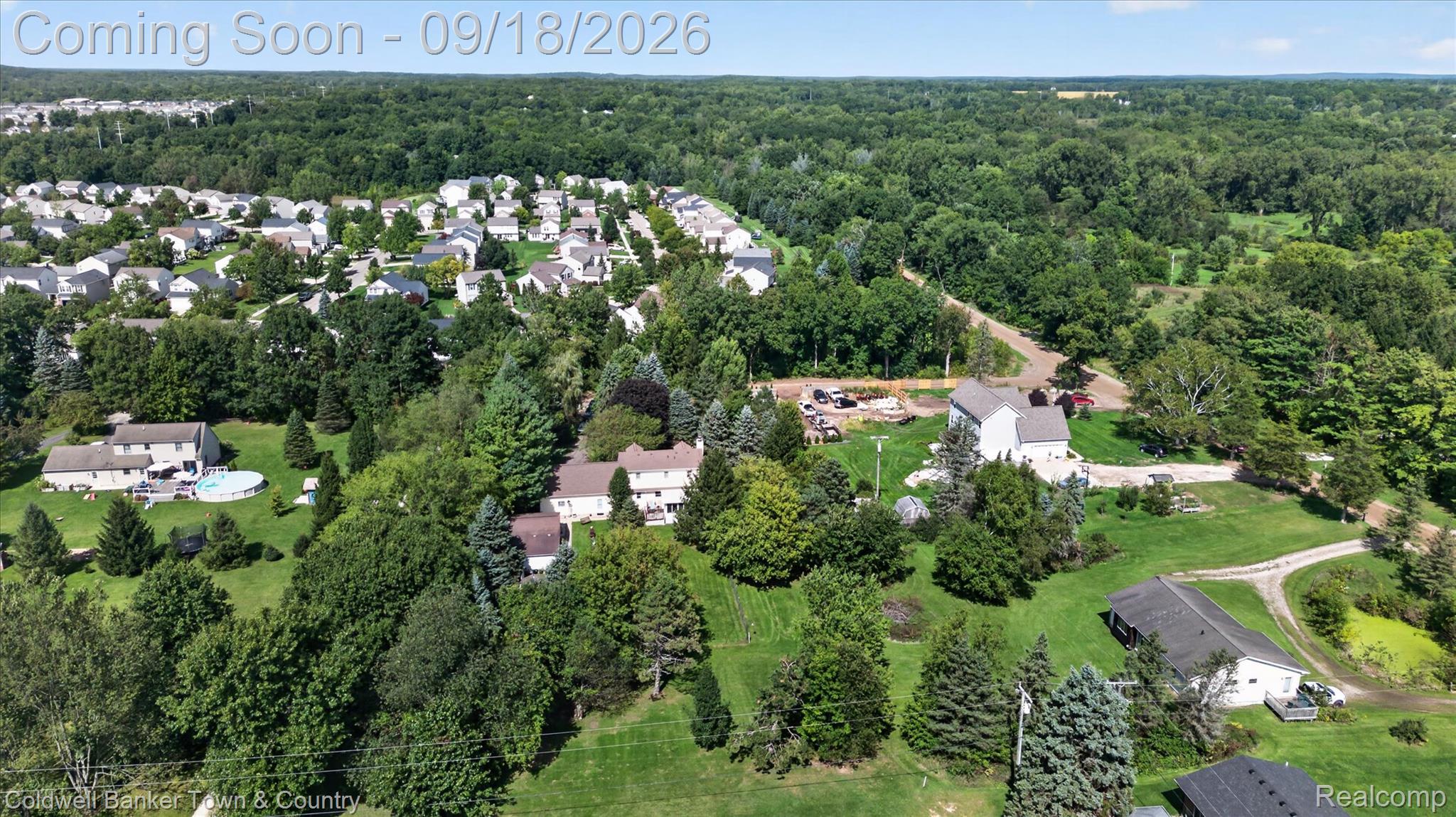 4442 McGunn Road Howell, MI 48843 - Photo 60 of 63 Expansive property featuring mature trees, a private driveway, multiple residential structures, and proximity to established residential areas