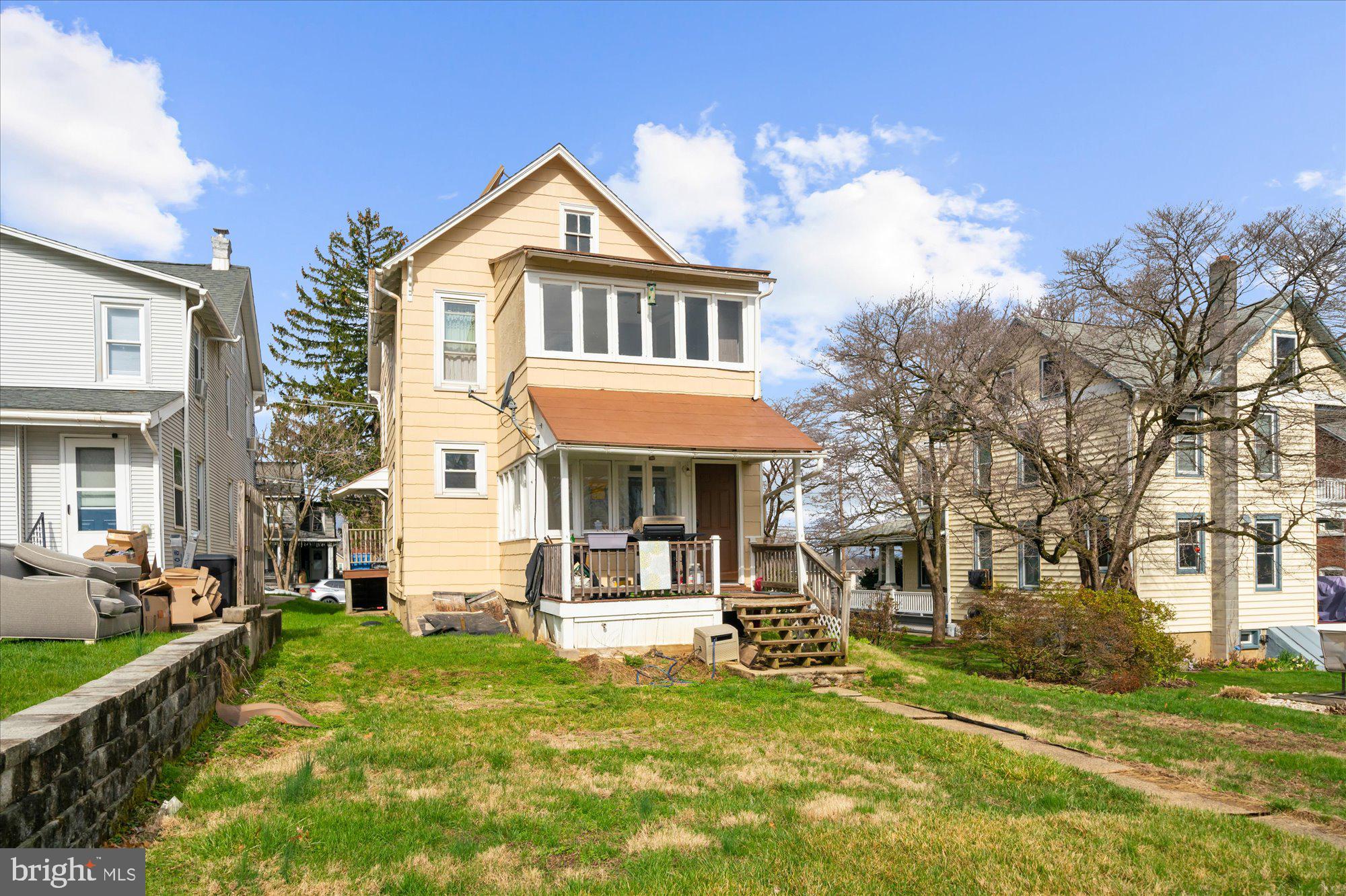 109 New Holland Avenue Reading, PA 19607 - Photo 5 of 36 a front view of a house with garden