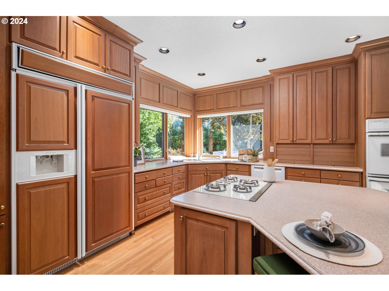 4083 Southeast Augusta Loop Gresham, OR 97080 - Photo 11 of 48 a kitchen with stainless steel appliances granite countertop a refrigerator sink and cabinets