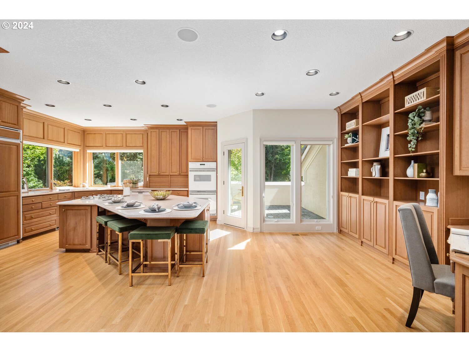 4083 Southeast Augusta Loop Gresham, OR 97080 - Photo 12 of 48 a open kitchen with a table and chairs