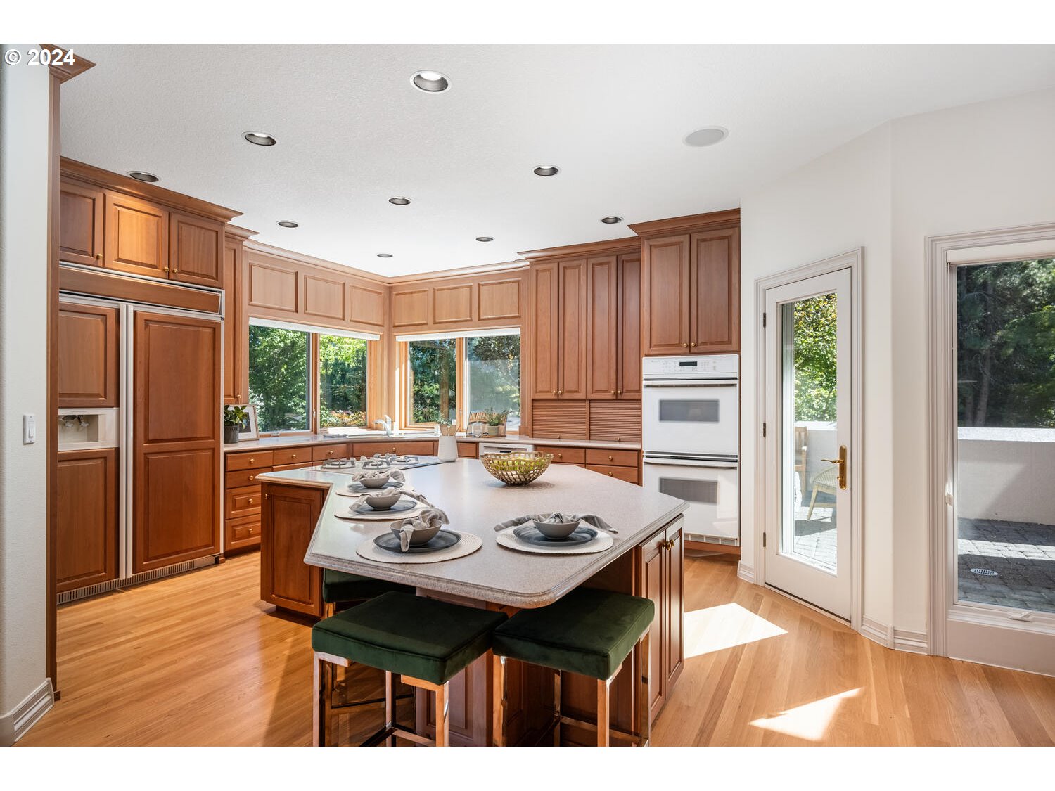 4083 Southeast Augusta Loop Gresham, OR 97080 - Photo 14 of 48 a view of a dining room with furniture window and wooden floor