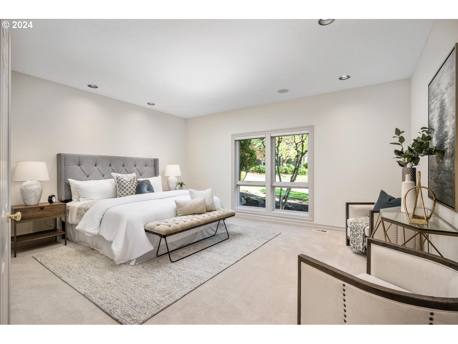 4083 Southeast Augusta Loop Gresham, OR 97080 - Photo 25 of 48 a bedroom with a bed window and chair