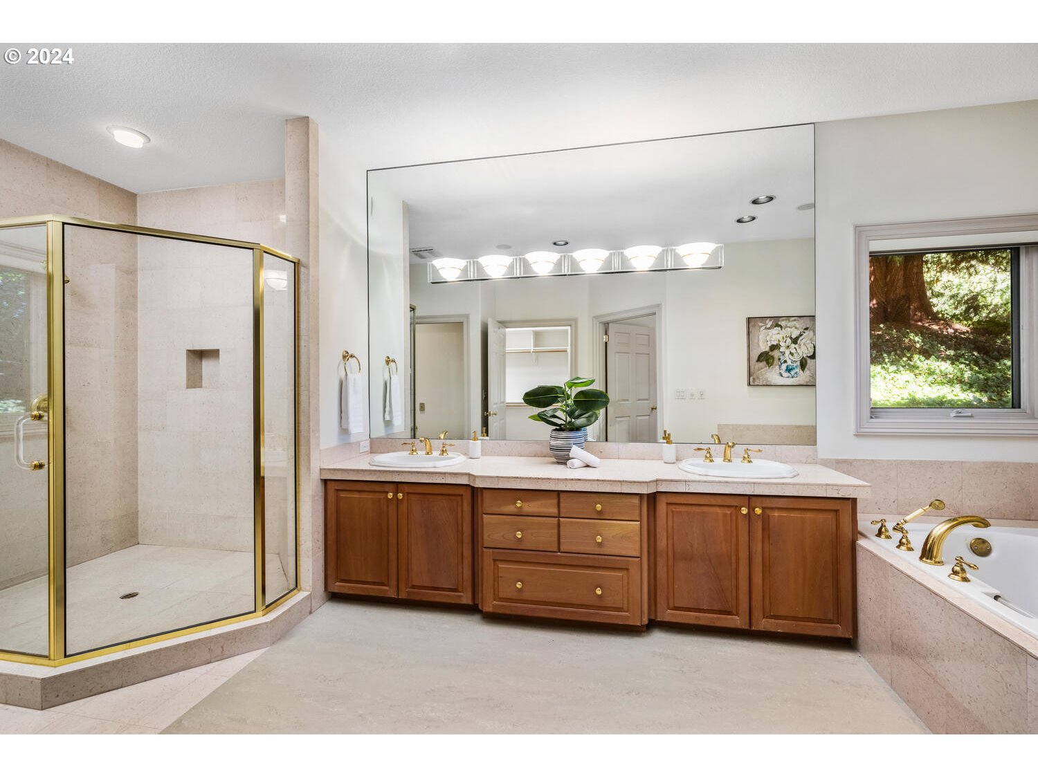 4083 Southeast Augusta Loop Gresham, OR 97080 - Photo 27 of 48 a bathroom with a tub sink shower and mirror