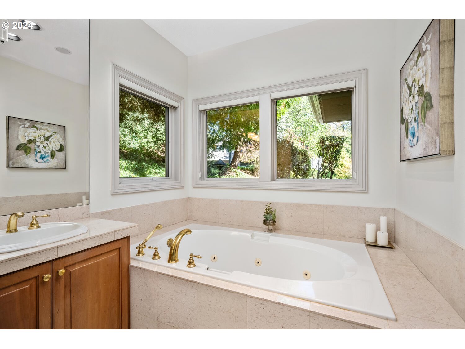 4083 Southeast Augusta Loop Gresham, OR 97080 - Photo 28 of 48 a bathroom with a bathtub a sink a window and a shower