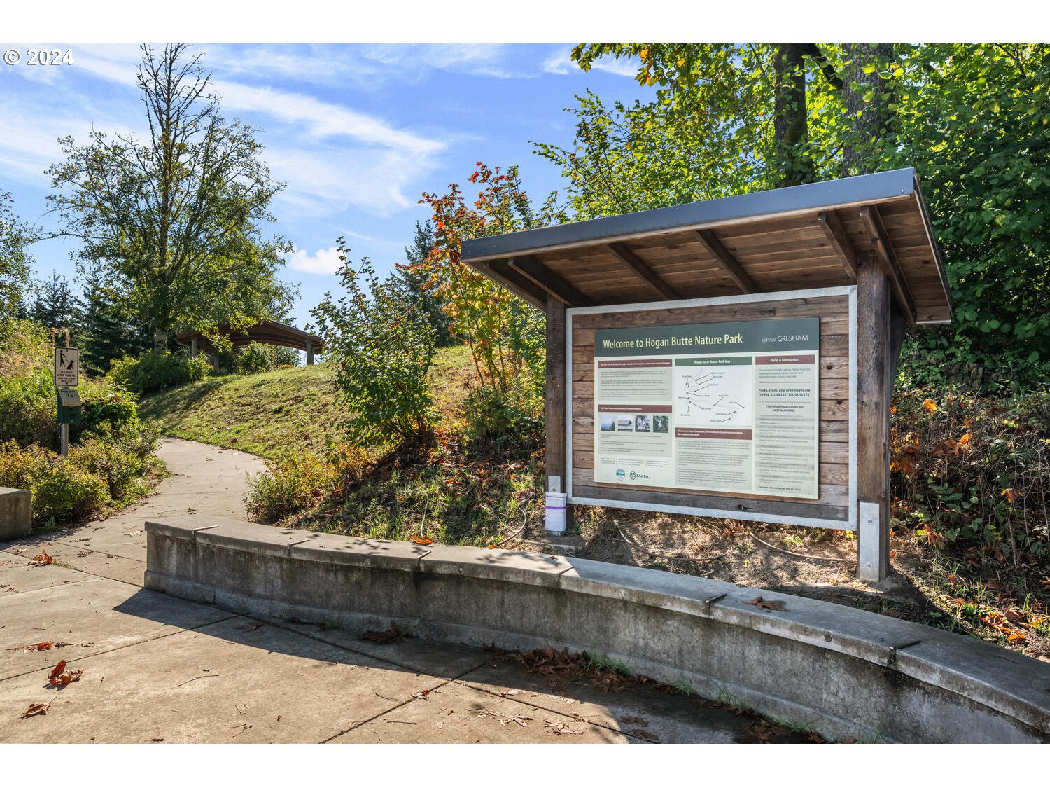 4083 Southeast Augusta Loop Gresham, OR 97080 - Photo 44 of 48 a front view of a house with a yard