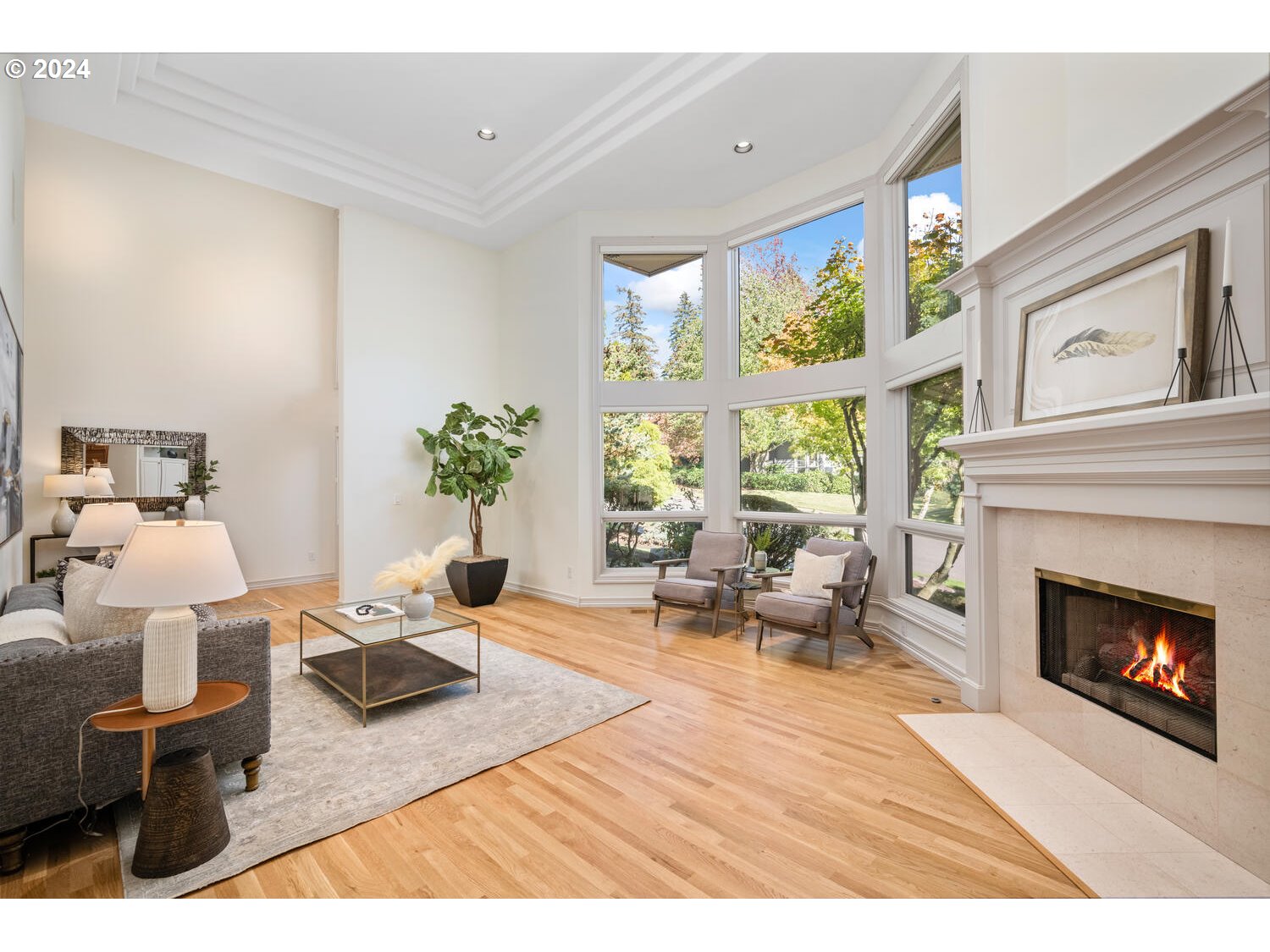 4083 Southeast Augusta Loop Gresham, OR 97080 - Photo 7 of 48 a living room with furniture large window and a fireplace