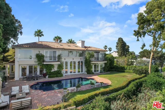 a bathroom with a sink mirror toilet and bathtub