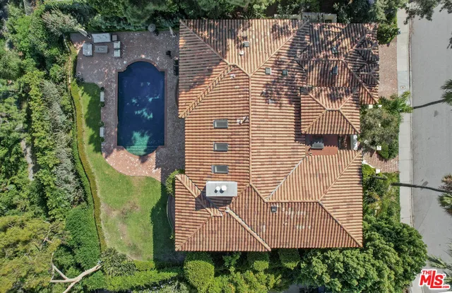 a living room with fireplace furniture and a fireplace