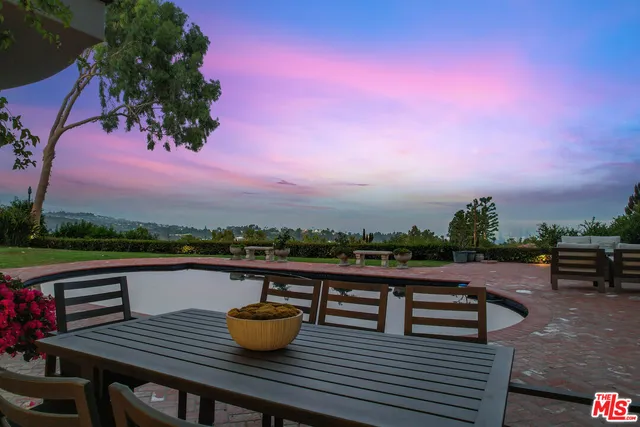 a view of a golf course with a lake